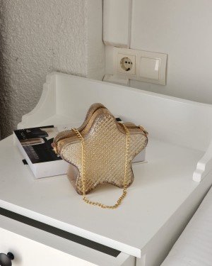 Kadın Şeffaf Gold Silikon Yıldız Formlu Zincir Detaylı Çapraz Çanta Kadın Şeffaf Gold Silikon Yıldız Formlu Zincir Detaylı Çapraz Çanta